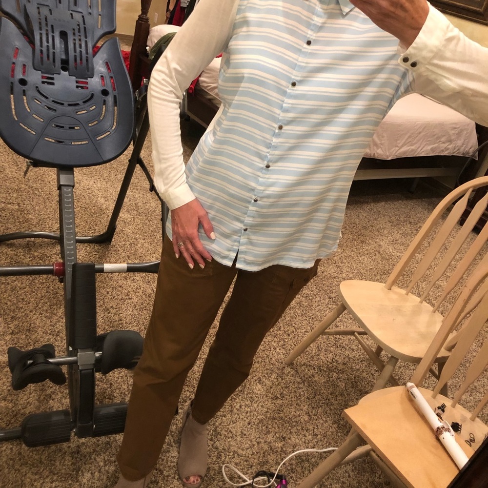 Women’s top. Light blue and white.  Size medium.
